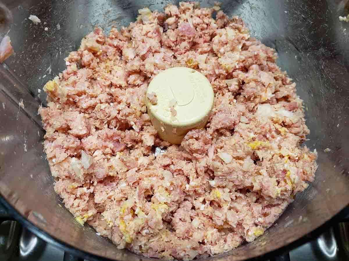ham, hard boiled eggs, onion, mustard, and pickle relish in a food processor.