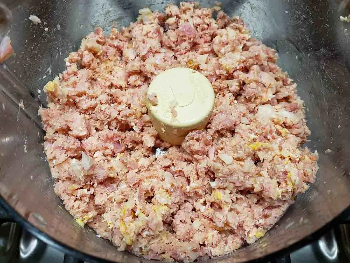ham, hard boiled eggs, onion, mustard, and pickle relish in a food processor.