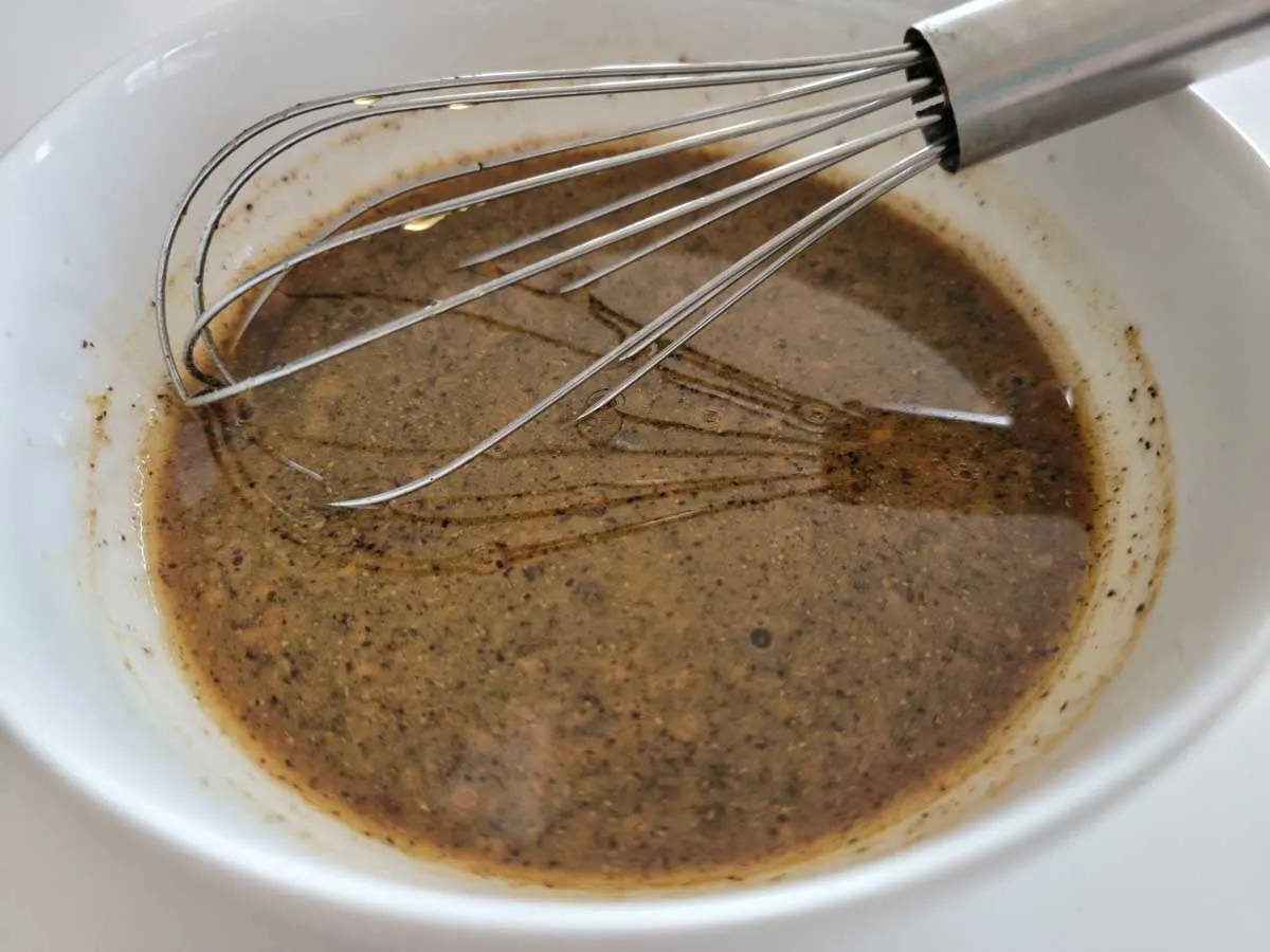 stir fry brown sauce whisked in a bowl.
