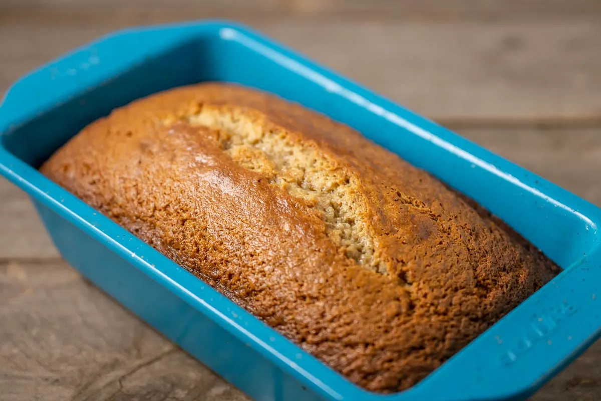 a loaf of banana bread in a loaf pan.
