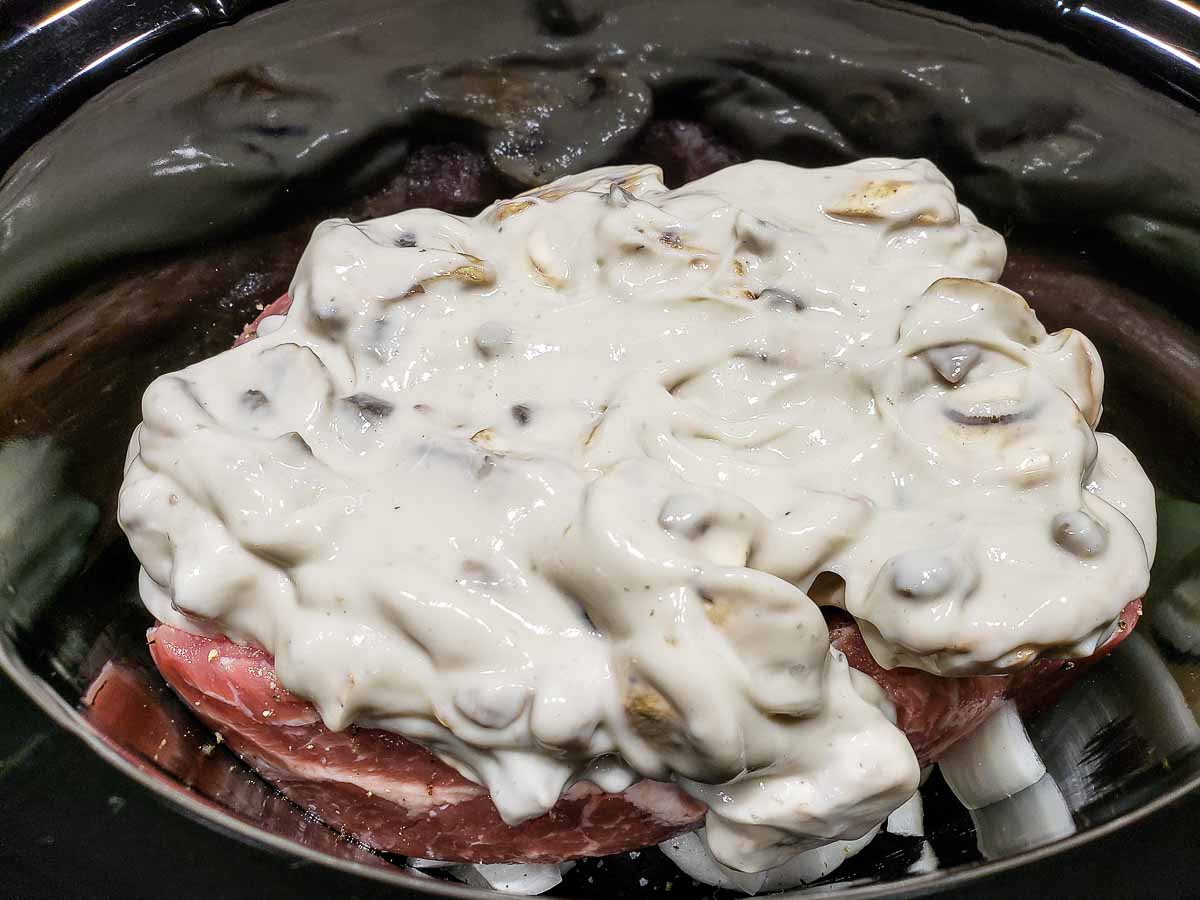 cream of mushroom gravy over country ribs in a crockpot.