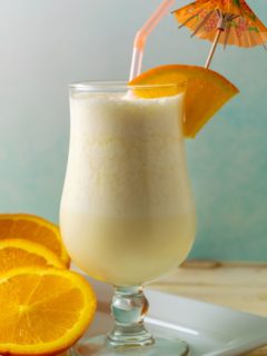 Orange Juice Slush in a tall glass.