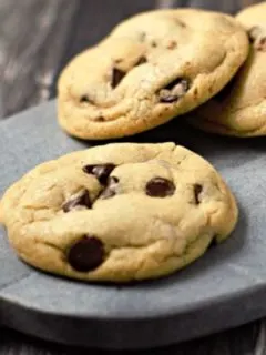 Soft Batch Chocolate Chip Cookies on a cutting board.