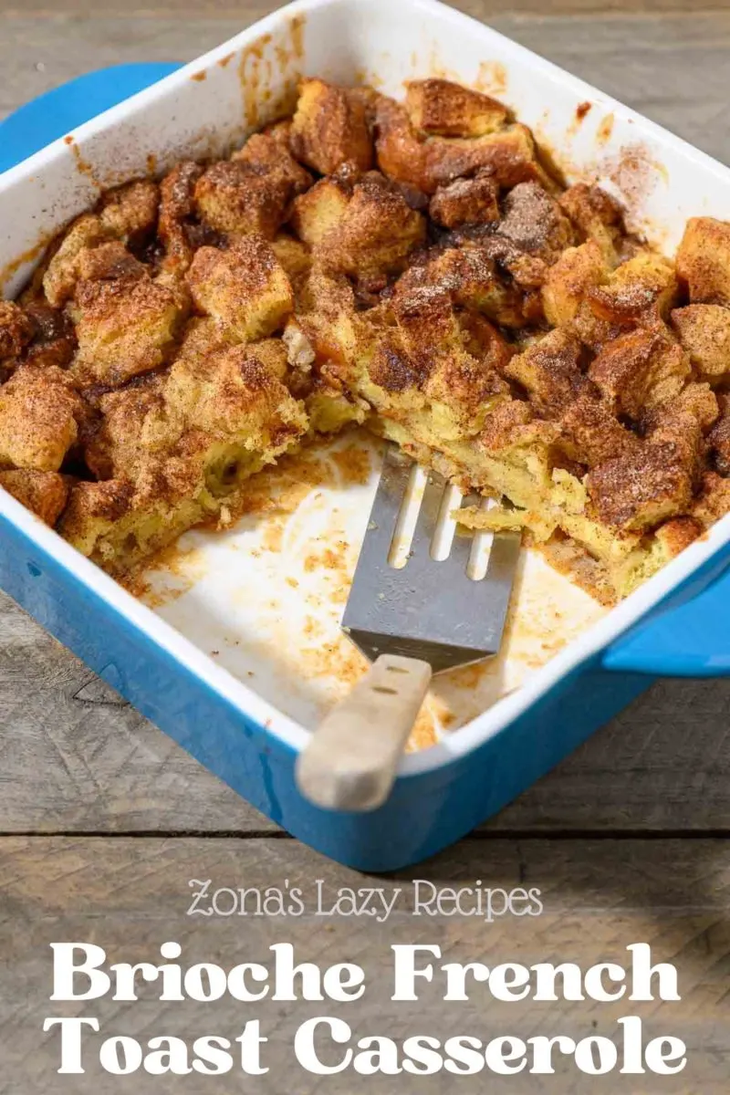 Brioche French Toast Casserole in a baking dish with one slice missing.