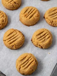 Chewy Peanut Butter Cookies on a baking sheet.