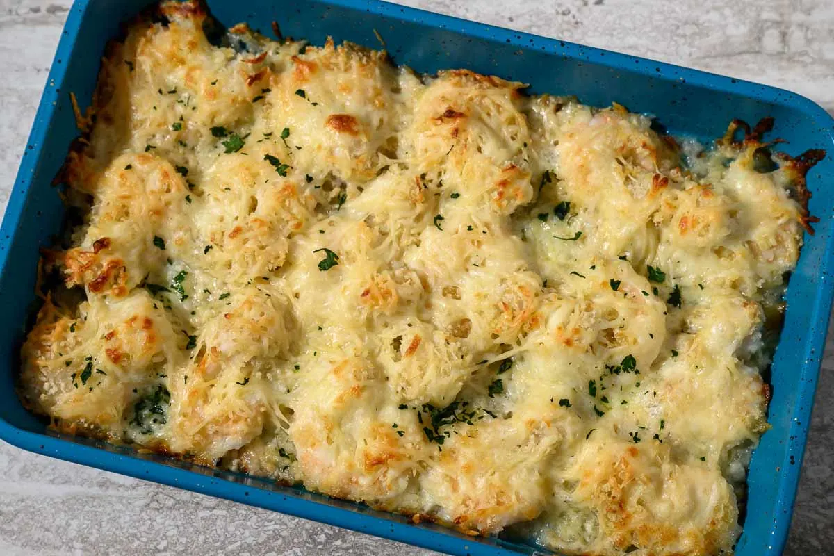 Baked Scallops and Shrimp in a casserole dish.