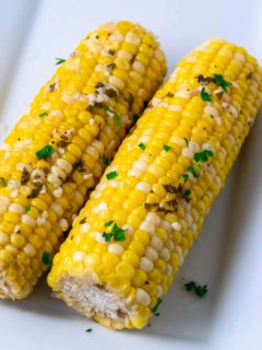 Foil Corn on the Cob on a plate.