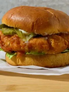 Crispy Buttermilk Chicken Sandwich on parchment paper.