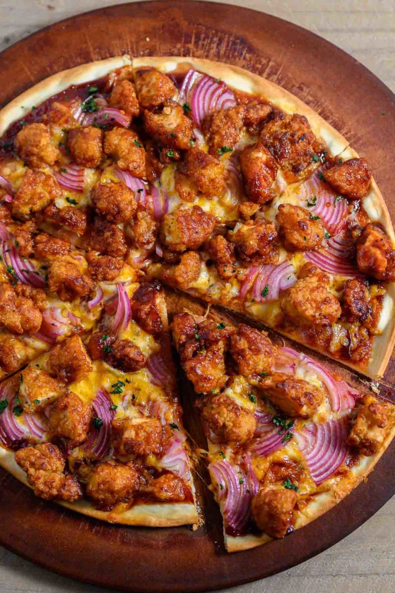 Chicken Nugget Pizza on a pizza stone.