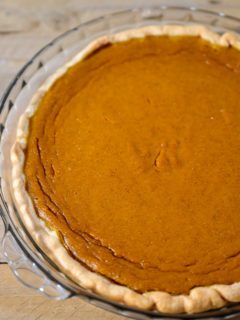 Pumpkin Pie without Evaporated Milk in a glass pie dish.