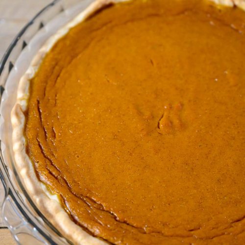 Pumpkin Pie without Evaporated Milk in a glass pie dish.