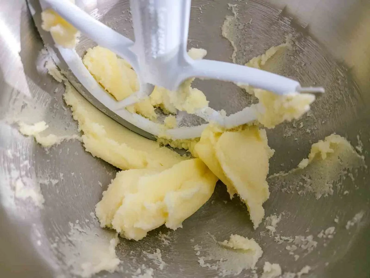 butter and sugar creamed in a mixing bowl.