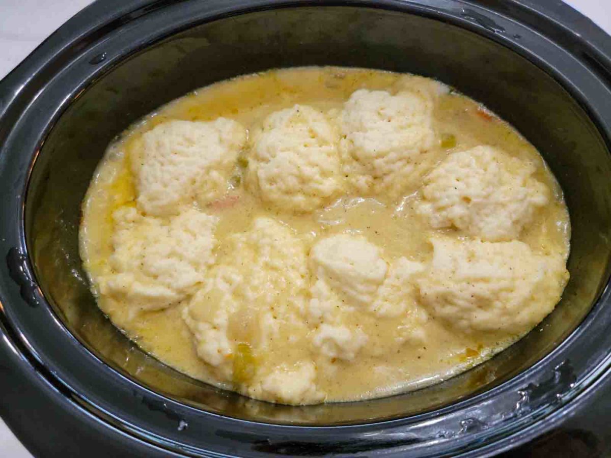Crock Pot Dumplings and chicken stew in a slow cooker pot.
