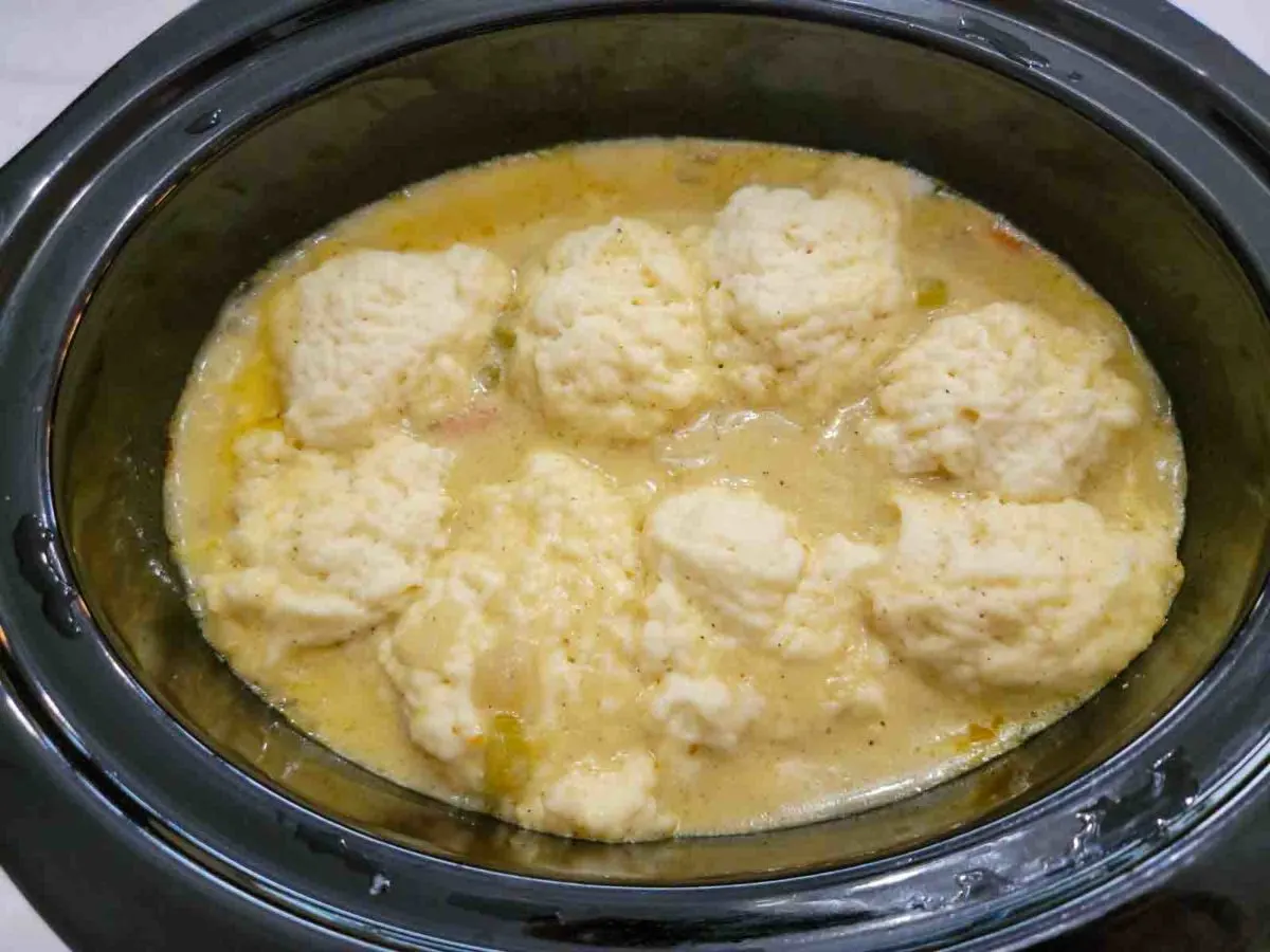 Crock Pot Dumplings and chicken stew in a slow cooker pot.