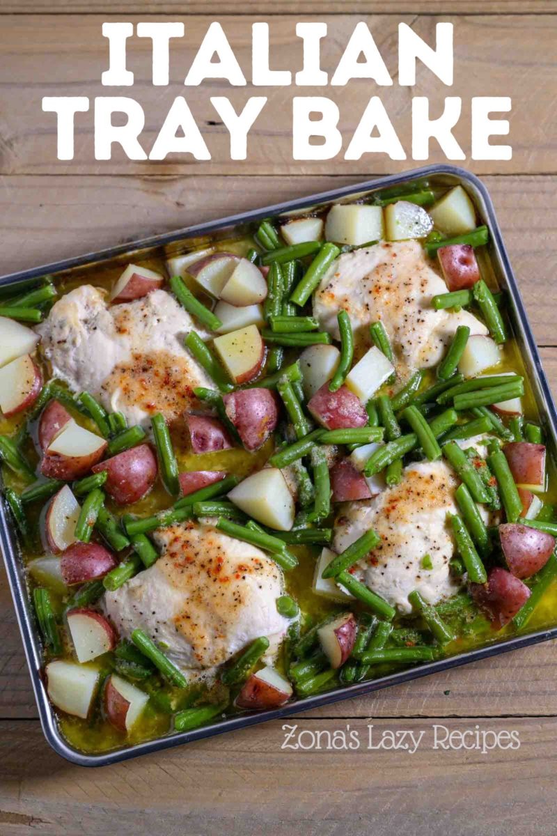 Italian Tray Bake on a sheet pan filled with boneless chicken, red potatoes and green beans.