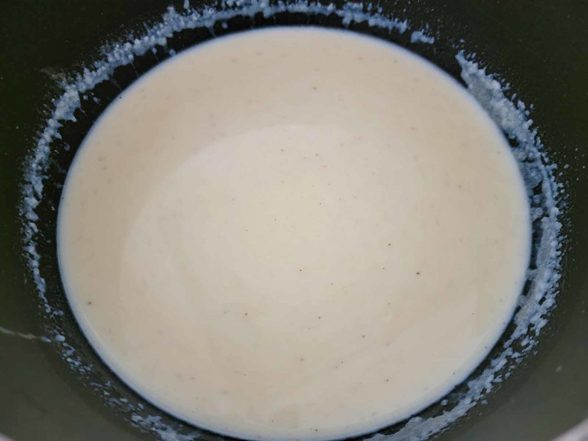 milk, butter, flour, dry mustard, and black pepper whisked in a sauce pan.