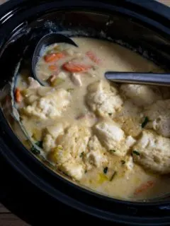 Crock Pot Dumplings and chicken stew in a slow cooker.