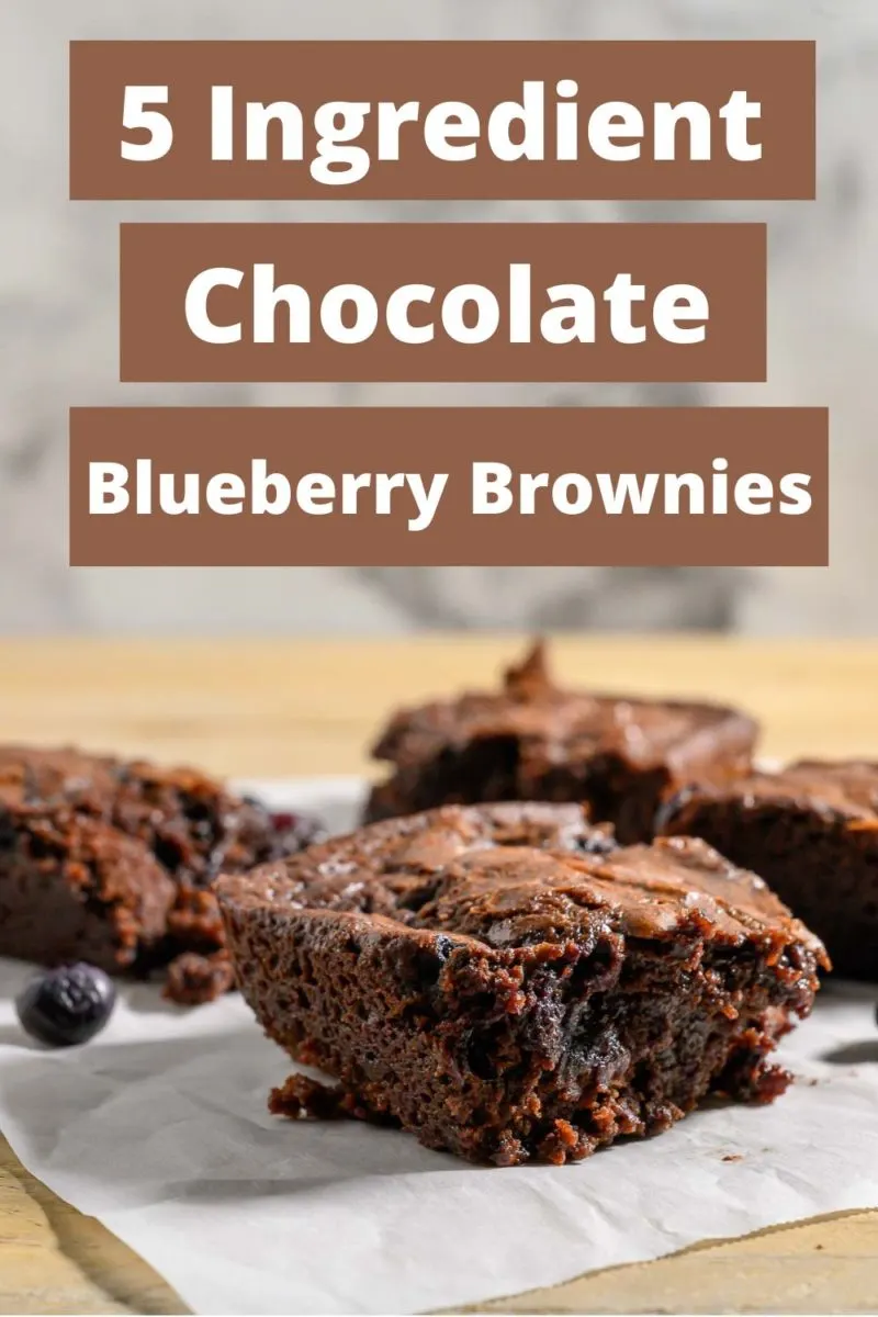 Brownie with Blueberry on parchment paper.