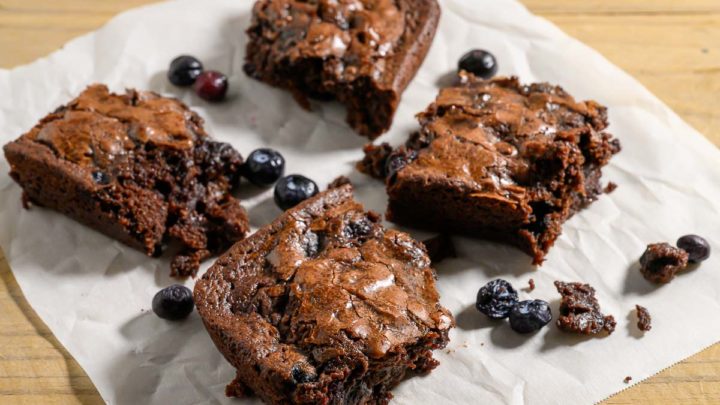 5 Ingredient Brownies on parchment paper.