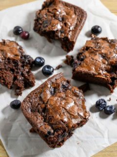 Blueberry Brownies on parchment paper.