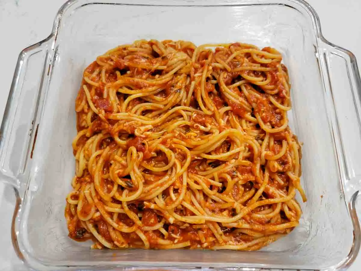 spaghetti and sauce in a baking dish.