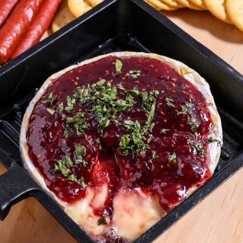 4 Ingredient Brie and Jam in a small cast iron pan.