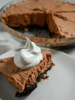 No Bake Chocolate Mousse Cheesecake on a plate and in a pie pan.