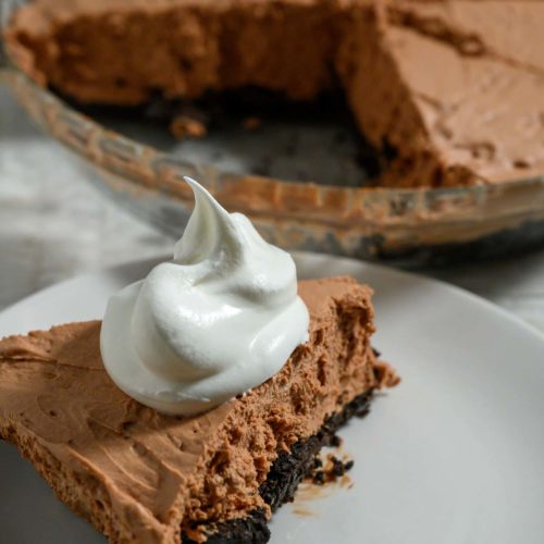 No Bake Chocolate Mousse Cheesecake on a plate and in a pie pan.