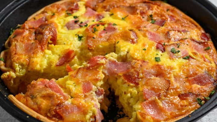 Easy Bacon Pepperoni Quiche in a cast iron skillet.