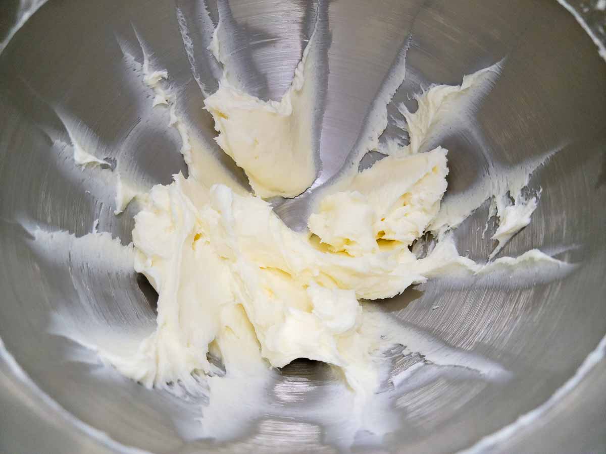 cream cheese and sugar mixed in a bowl.