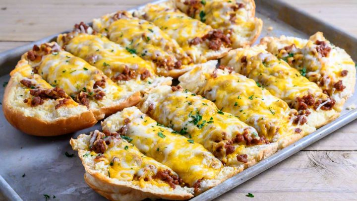 Ground Beef and Garlic Bread Recipe on a cookie sheet.