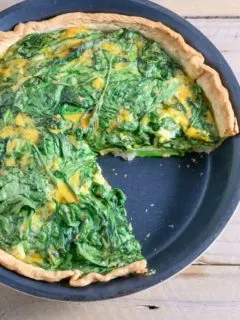 5 Ingredient Quiche with Spinach in a pie pan.