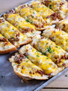 Ground Beef and Garlic Bread Recipe on a baking sheet.