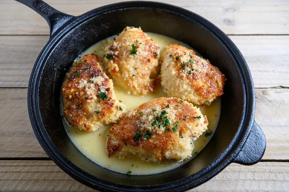 Macadamia Nut Chicken with Honey Brown Butter Cream Sauce in a frying pan.