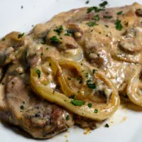 Creamy Mushroom Pork Steak on a plate.