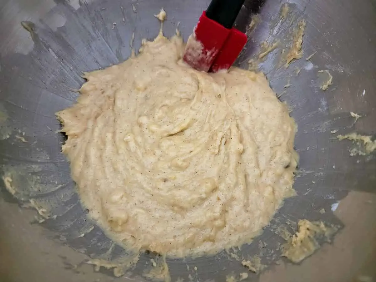 banana muffin batter mixed in a bowl.