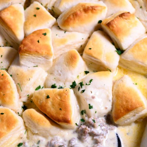 6 Ingredient Biscuits and Gravy Casserole in a baking dish.