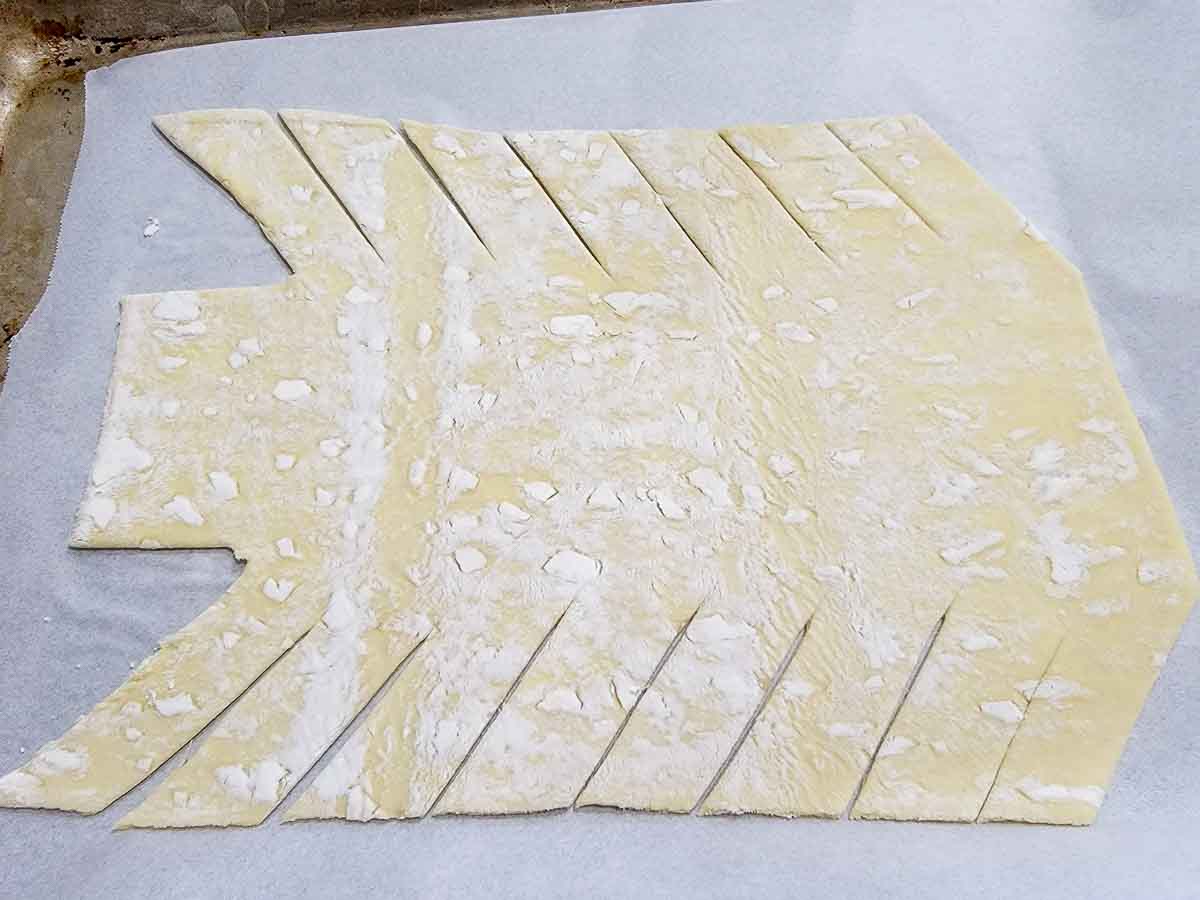 puff pastry with slits cut into each side.