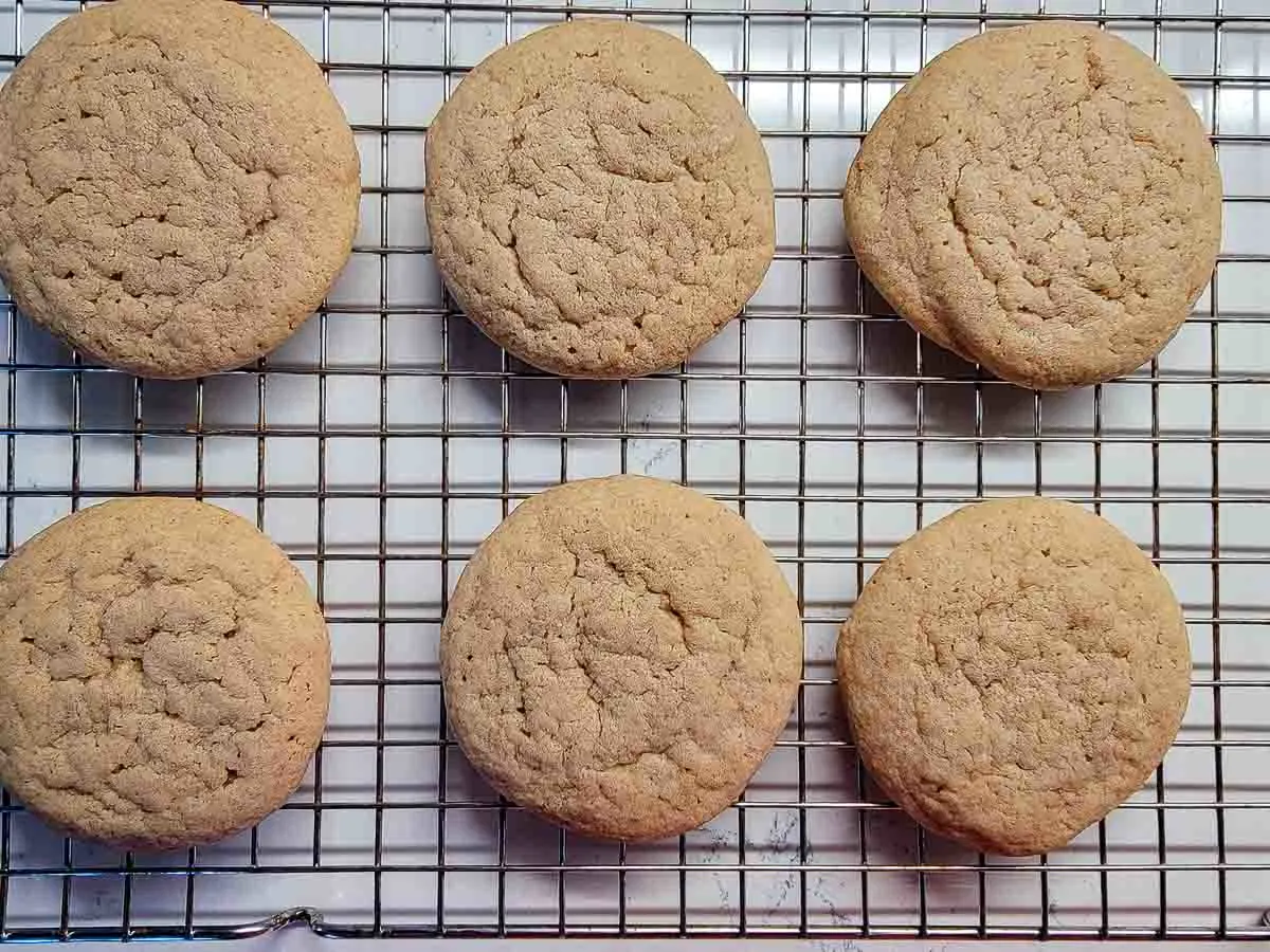 cinnamon cookies cooling on a wire rack.