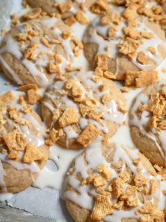 Cinnamon Toast Crunch cookies on a cookie sheet.