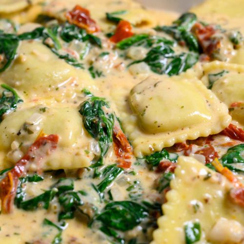 Creamy Tuscan Ravioli in a dish.